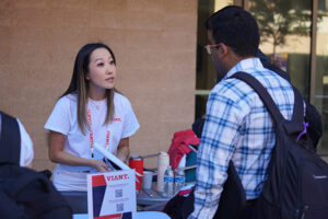 Viant staff speaking with student